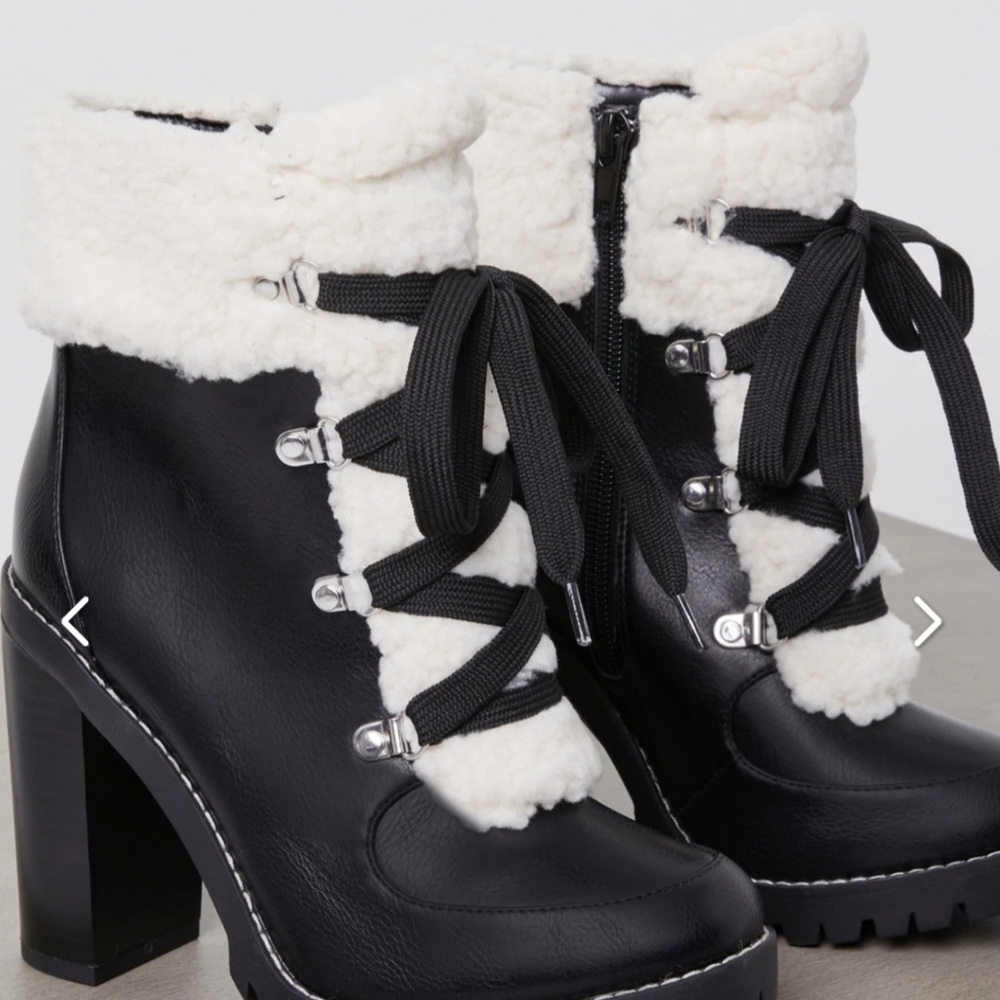 Women's BCBG black heeled Women's winter boots size 6. Brand new.